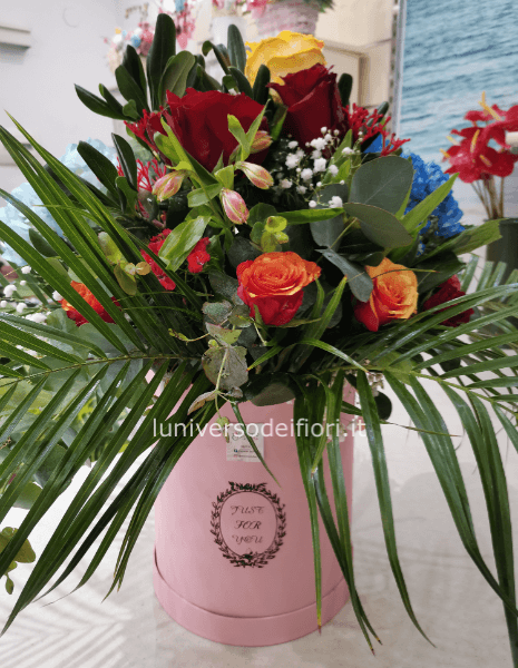 Centrotavola basso di rose e candela